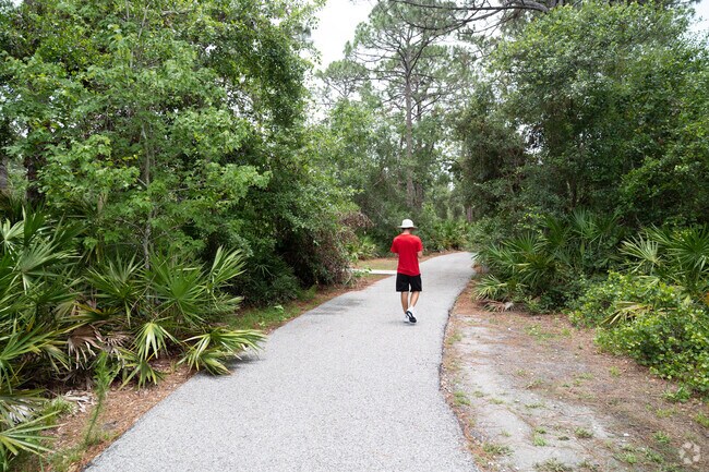 Conservatory Park has over a mile of tranquil paved walkways through a dense nature preserve.