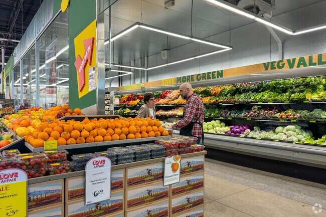 Residents shop for fresh foods at the Whole Foods Market in Wallhaven.