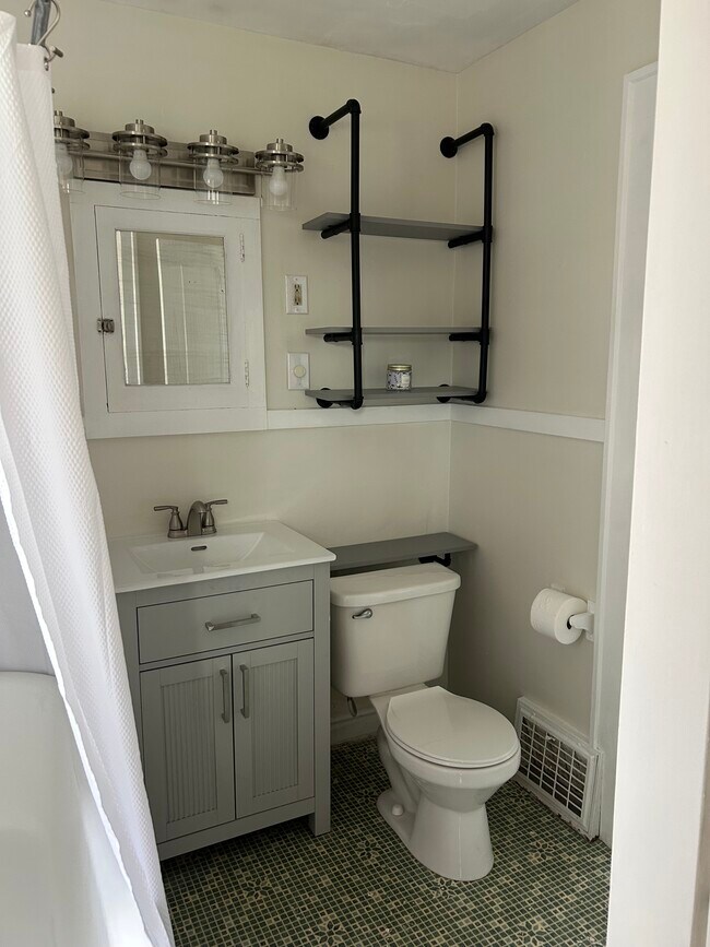 Bathroom with claw foot tub/ shower