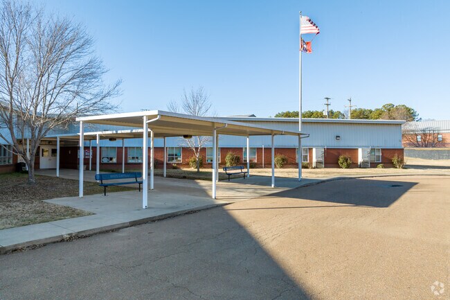 The covered walkway at Strayhorn Elementary in Tate County keeps students dry on rainy days.
