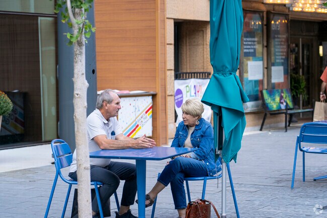 There are a lot of outside seating to chat with friends in the Peace Plaza near Parkway.