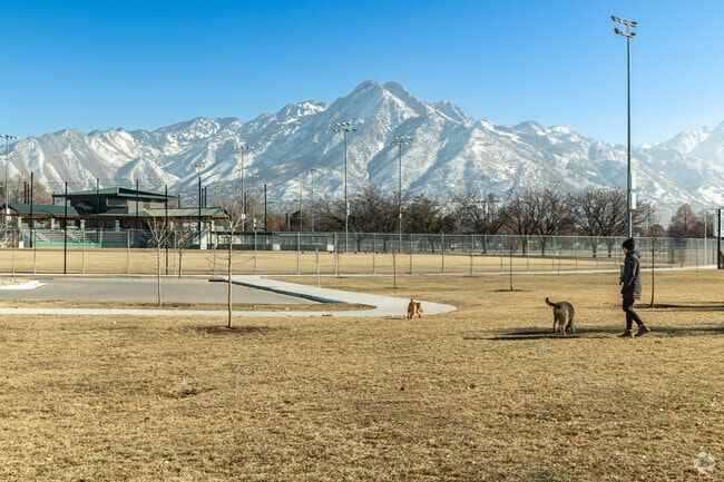 The 80‑acre Big Cottonwood Regional Park includes a paved trail for running and walking.