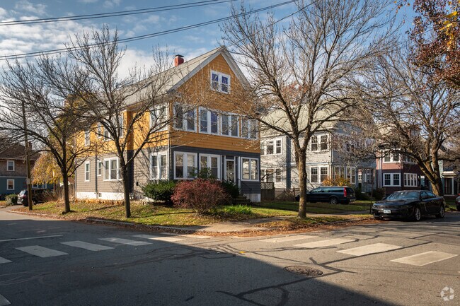 Tree-lined sidewalks frame condo homes in Hope’s quiet residential neighborhood.