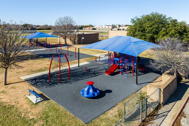 Kids of all ages love the playground at Mary Moore Elementary School.