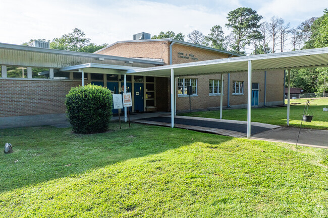 The faculty at Sykes Elementary School creates a supportive learning environment.