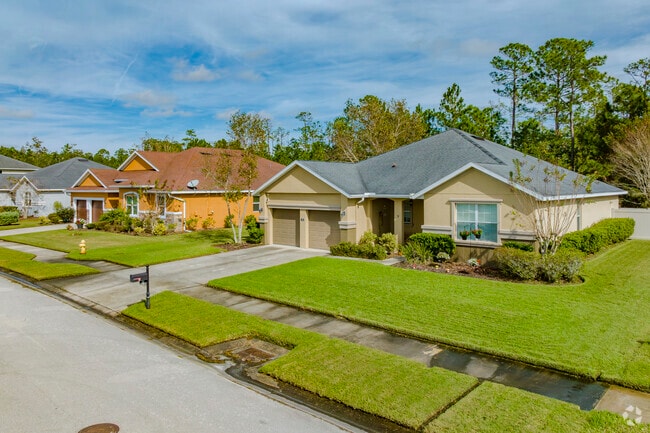This row of homes in Deer Creek showcases clean architectural lines and well manicured lawns.