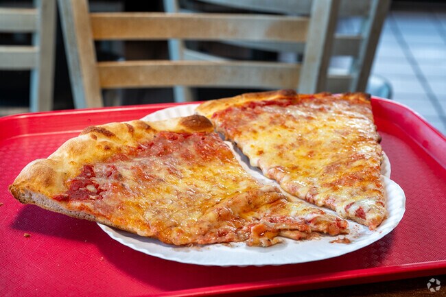 Three Brothers Italian restaurant in Edmonston sells pizza by the slice.