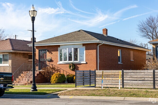 Red brick bungalow homes with medium sized lawns and detached garages are common.