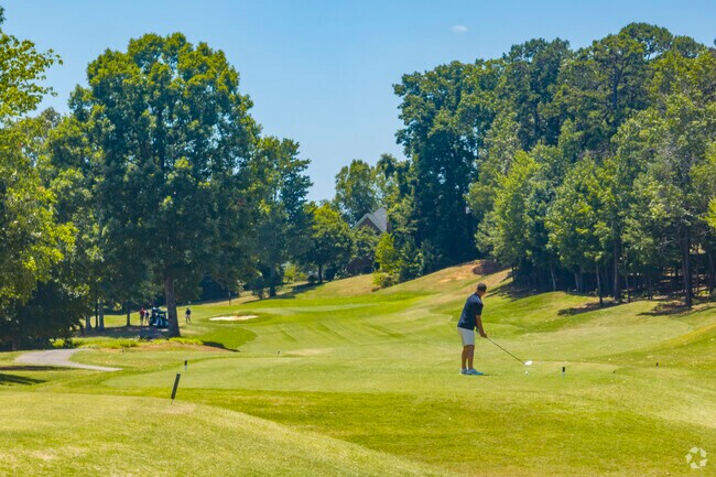 Residents of Northlakes can enjoy a round outside at the nearby Player's Ridge Golf Course.