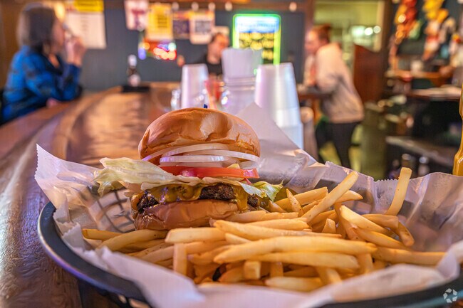 Order a burger and beer at Shotguns Saloon in Emerald