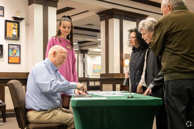 Folks gather their tickets for the first play of the year at the Old Post Office Playhouse.