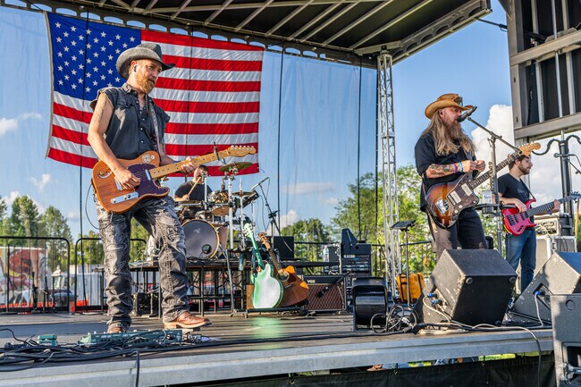 Bands play patriotic music at the 4th of July Independence Day Festival in Bartlett.