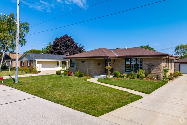 A row of ranch homes stands proudly in Wedgewood, Milwaukee.