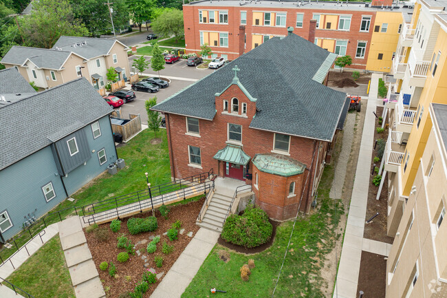 Immaculate Conception School is a small school with a well manicured front lawn.