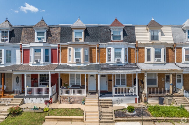 Row Homes in Greenwich typically have shady front porches.