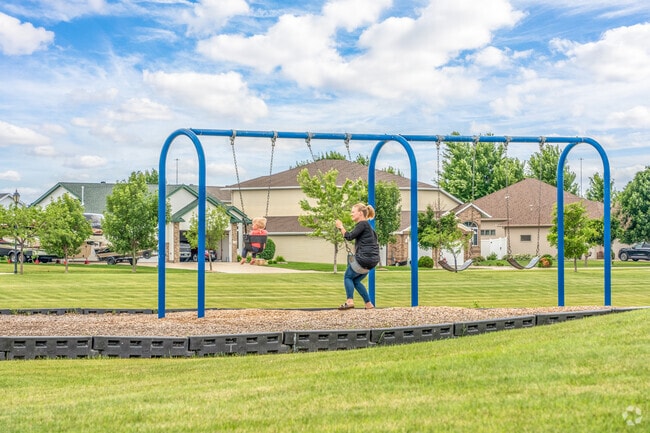Your kids will never want to leave the playground at Charleswood Park.