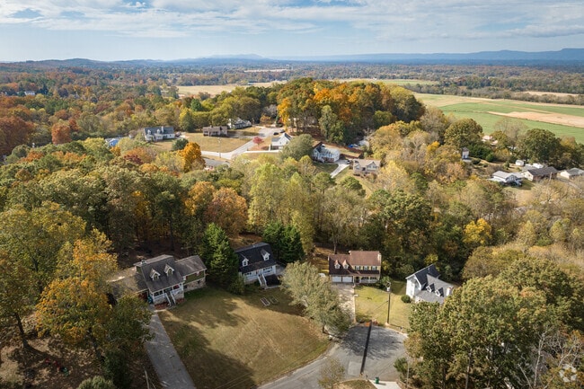 Blue Spring combines farmland with rolling tree-covered hills.