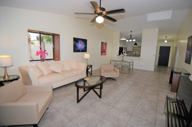 Large open floor plan. Spacious living room and dining area.