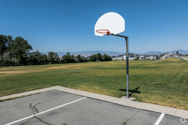 Douglas T. Orchard Elementary School’s outdoor amenities include a basketball court and large fi