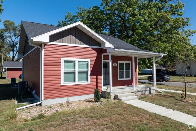 This red home in Roosevelt has a rustic feel that shows the charm of the neighborhood.