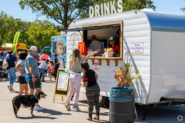 Residents enjoy fresh lemonade at the Lenexa Spinach Festival.