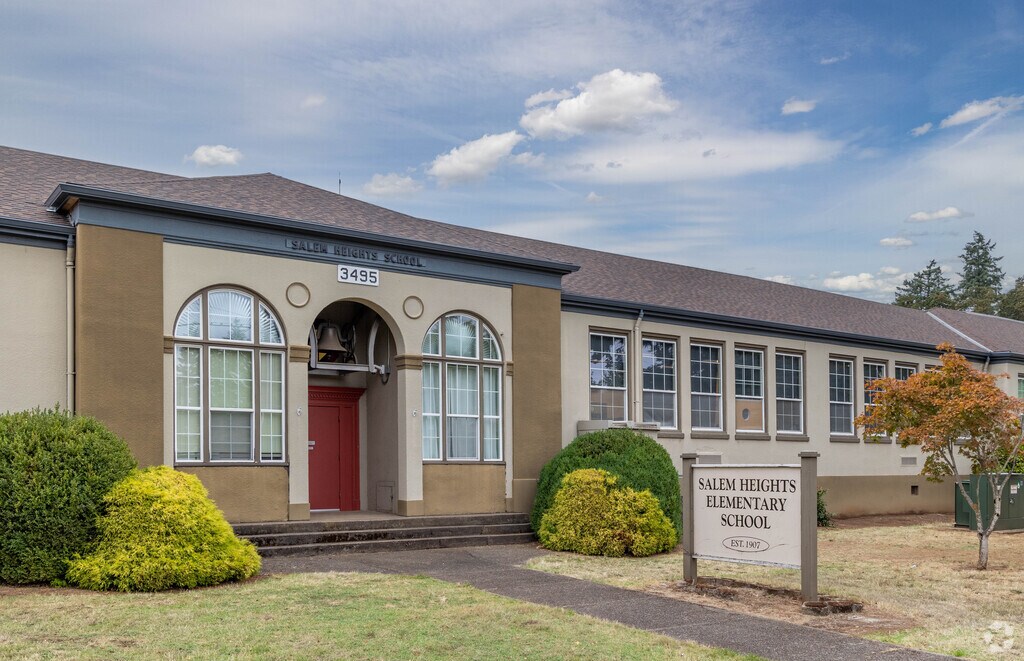 Salem Heights Elementary School's Church St entrance has the original bell from 1907.
