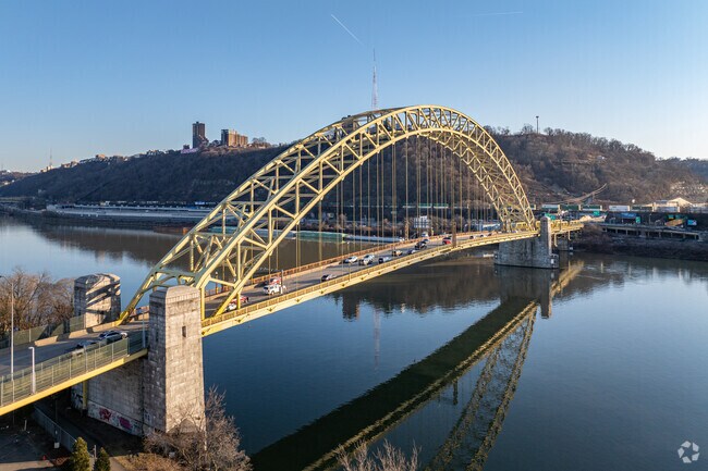 Let the West End Bridge lead you over the river to West End.
