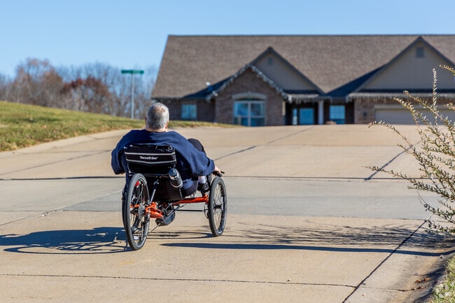 Columbia locals enjoy a peaceful bike rides through it's inviting residential streets, showcasing the town’s relaxed charm and active lifestyle.