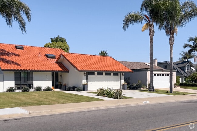 Spanish red tile roofs brighten the homes in Southeast Huntington Beach.