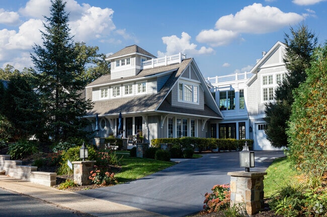 Elegant homes on tree covered roads in Deephaven convey a sense of charm and stature.