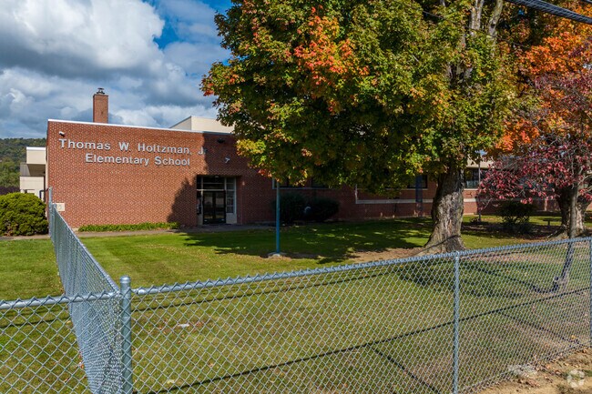 Younger students attend the Holtzman Elementary School.