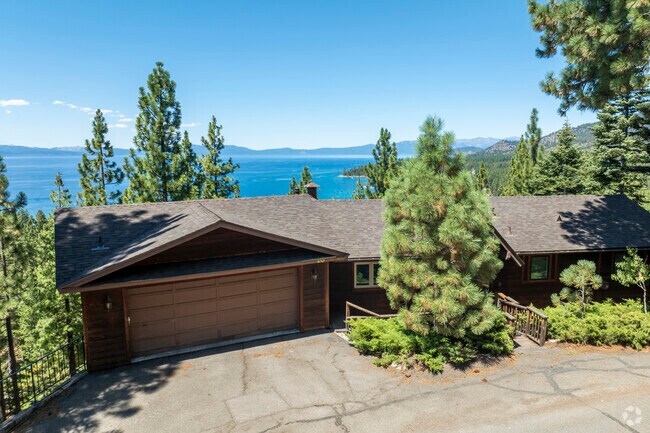 This traditional Craftsman build is representative of many fortunate homes that are perched in the mountains overlooking Zephyr Cove.