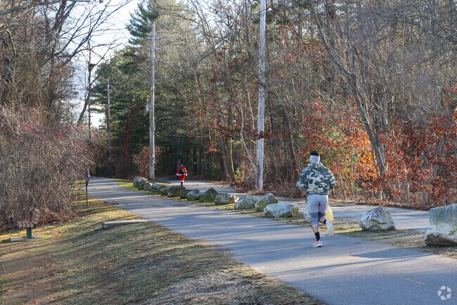 Residents near North Broadway jog around Crystal Lake trails.