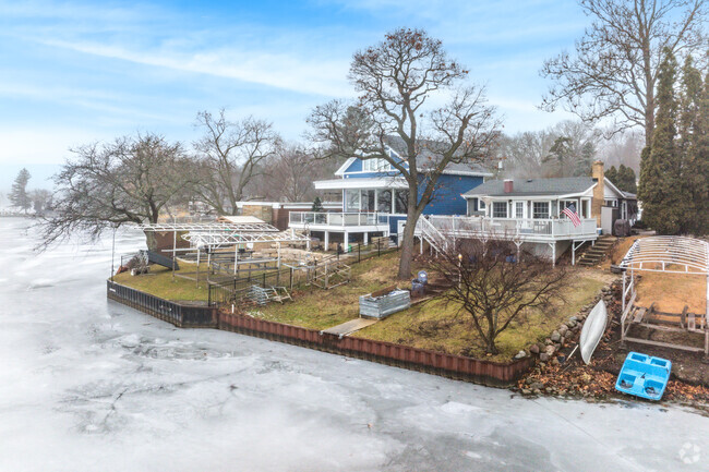 Beautiful lakefront homes with direct water access line the White Oaks Bay neighborhood.