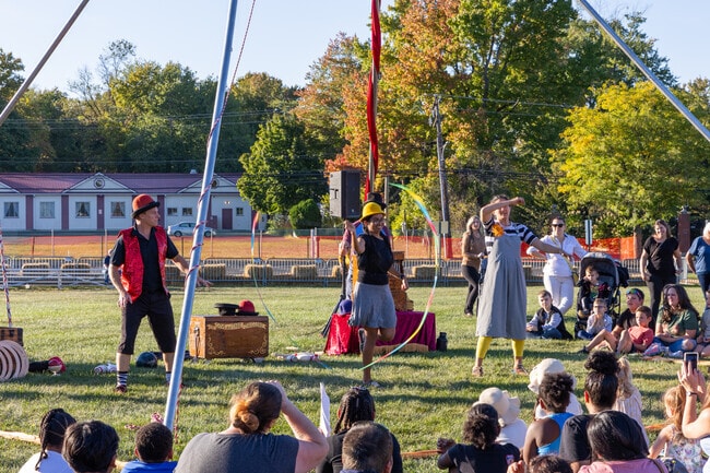 The circus performers pick on audience members at the Bensalem Family Fall Festival.