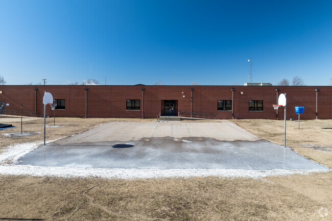 White Elementary School has an outdoor basketball court.