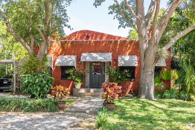 Wake up in a cozy Spanish-style home in Biscayne Park.