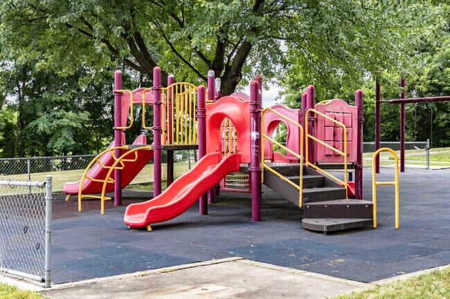 Vincennes Parklet provides a play area for Middle Hill kids and basketball courts for all.