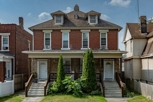 This is a 1920's era style duplex in the Reeb-Hosack neighborhood.