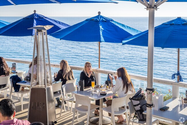 Enjoy fine dining at Cliff Restaurant in Laguna Beach that offers panoramic views of the ocean.