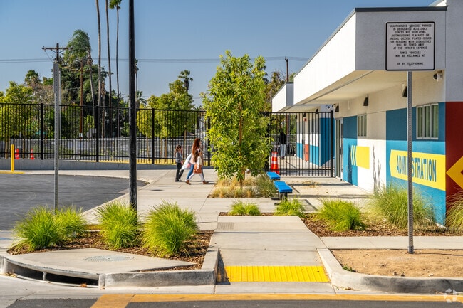 Enter Longfellow Elementary School through its welcoming entrance.