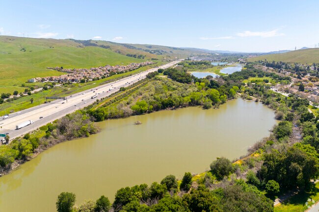 There is a body of water located near the 101 Highway in the Los Paseos neighborhood.