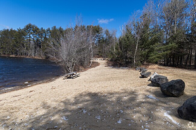 Newfield Public Beach by Rock Haven Lake provides a quiet swimming spot and a boat ramp.