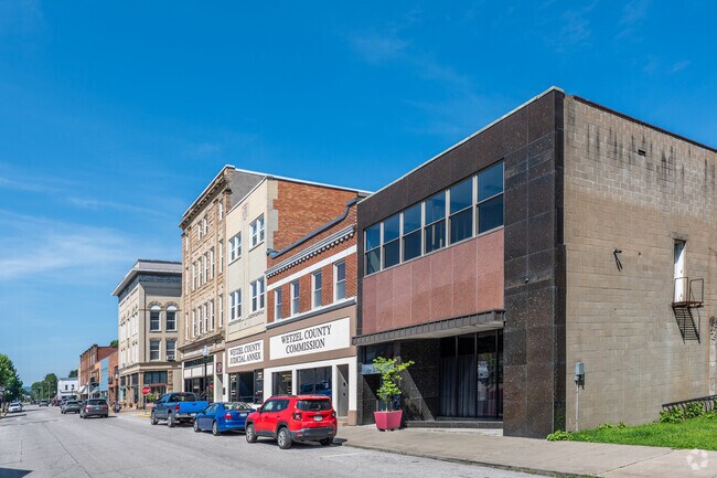Older buildings with local businesses line the downtown streets of New Martinsville.