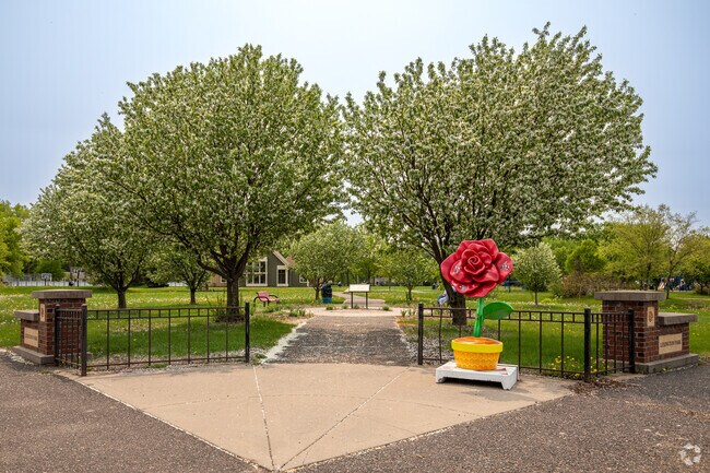The entrance gate and garden at Lexington Park in Roseville.