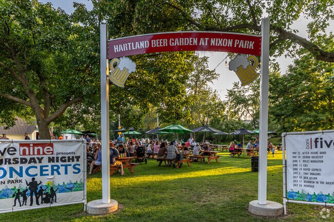 Residents enjoy live music and socializing at Hartland Beer Garden.