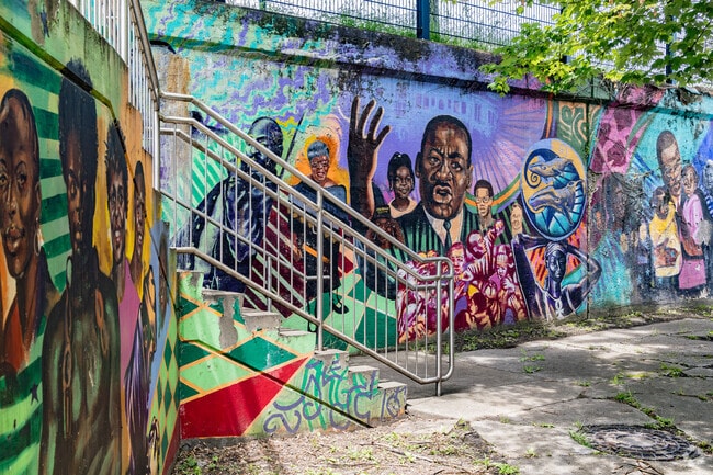 Martin Luther King Jr. is featured in a couple murals throughout the neighborhood Wilkinsburg.