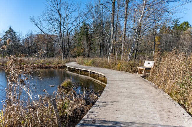 A boardwalk through the nature preserve at Schlitz Audubon Nature Center in Fox Point.