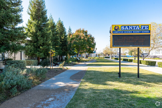 Walkway to Santa Fe Computer Science Magnet School LED sign.