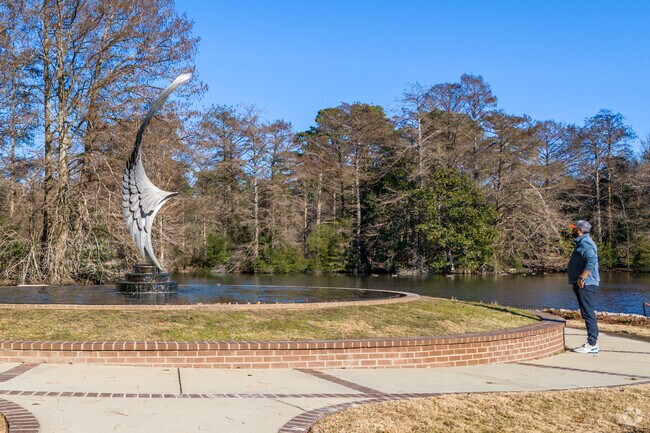 The Swan Lake Iris Garden has a variety of sculptures through out the park.